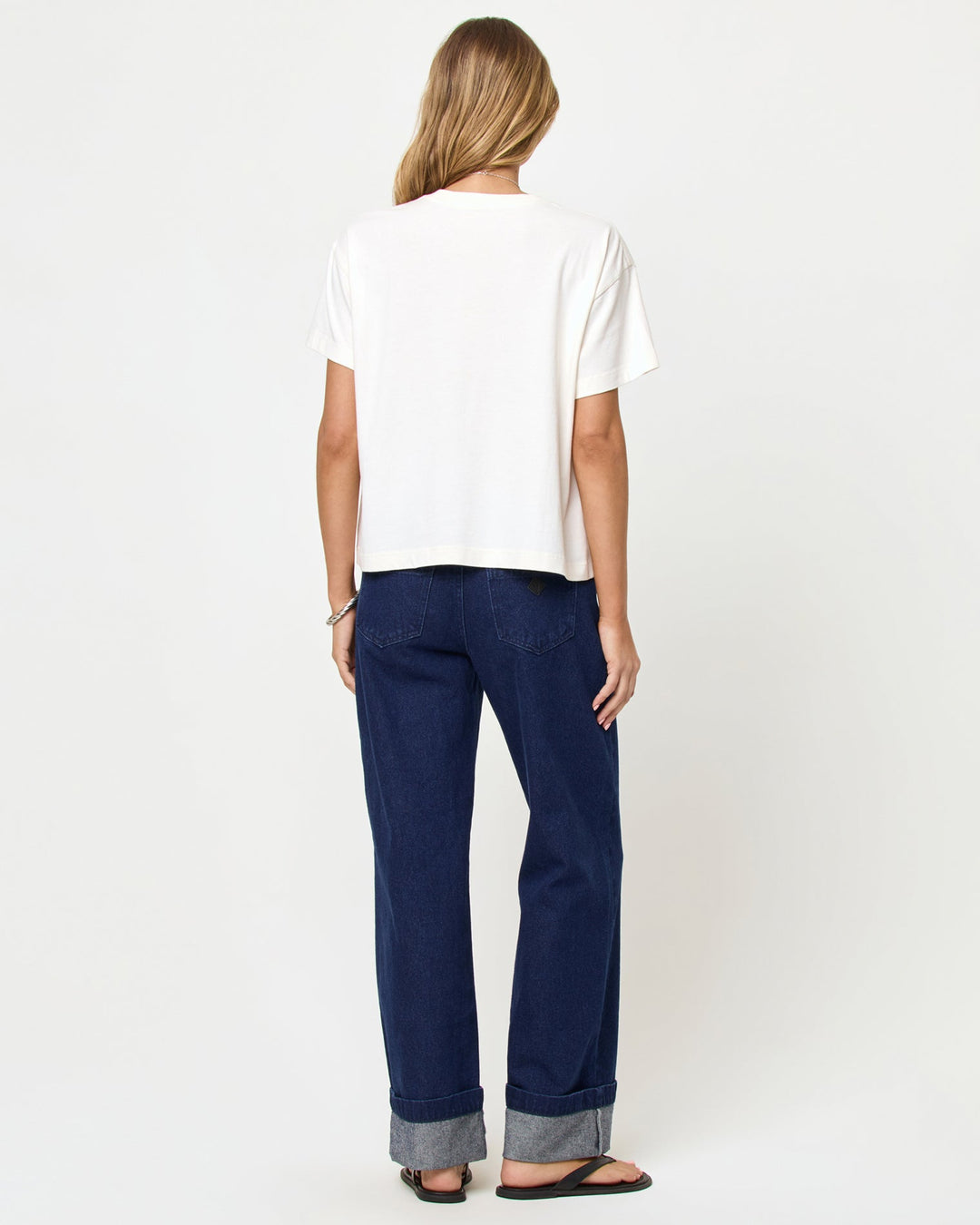LSPACE Everyday tee in cream, back view on model.