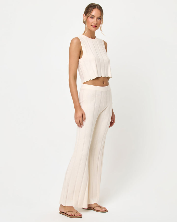 LSPACE Iris pant and En Route Top in tapioca, three-quarter view on model.