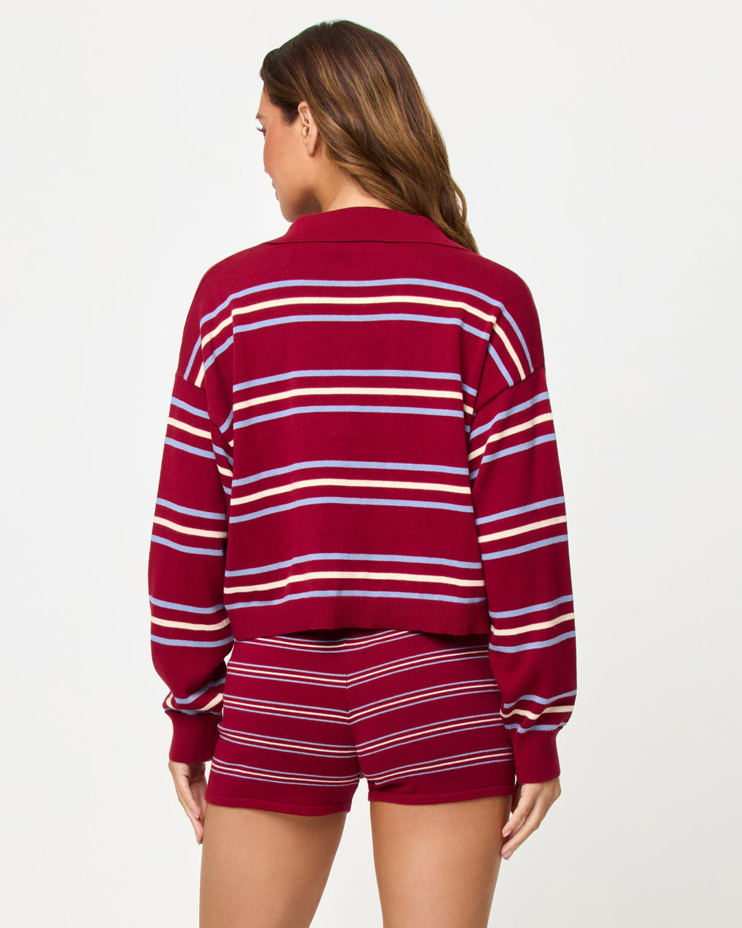 LSPACE Dalton Sweater and Short in berry wine stripe, back view on model.