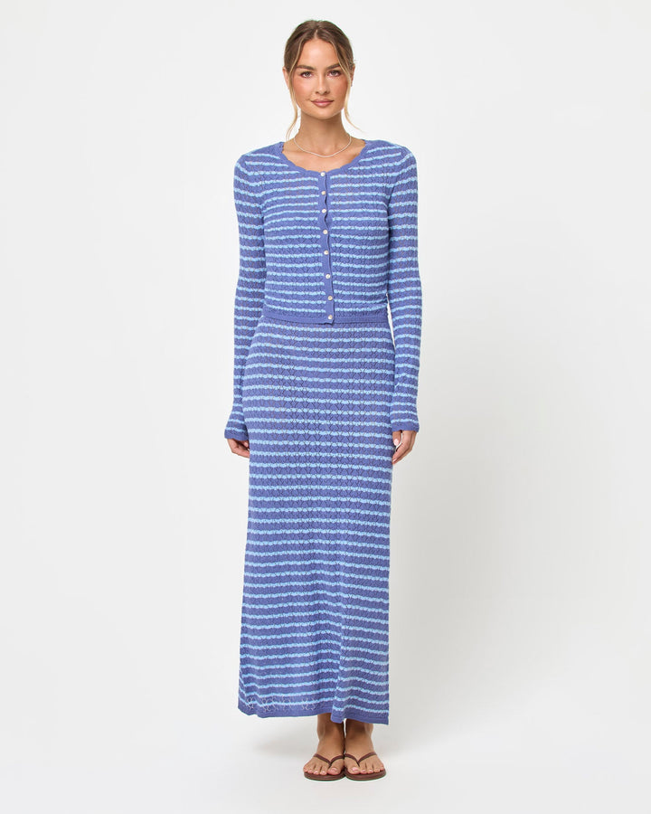 LSPACE Rosalie maxi dress in blue lagoon, styled with cardigan, front view on model.