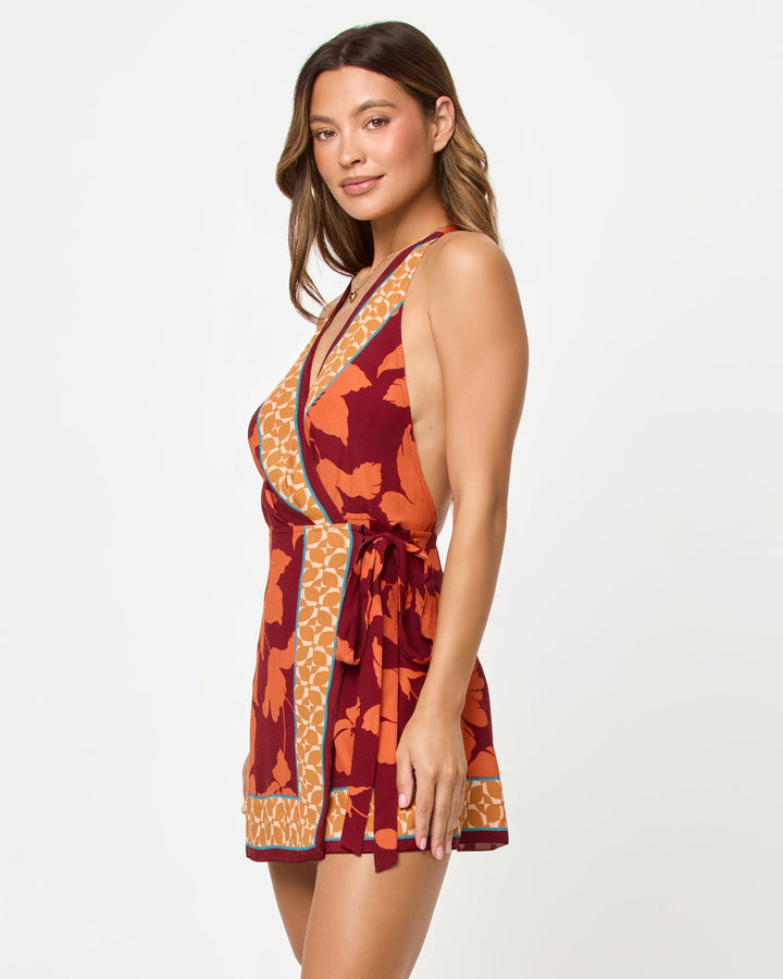 LSPACE Taura Mini Dress in Cocobolo print, side view on model.