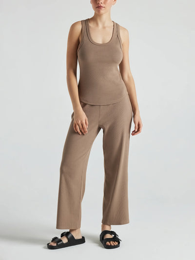 model wears light brown wide leg relaxed rib cropped pant