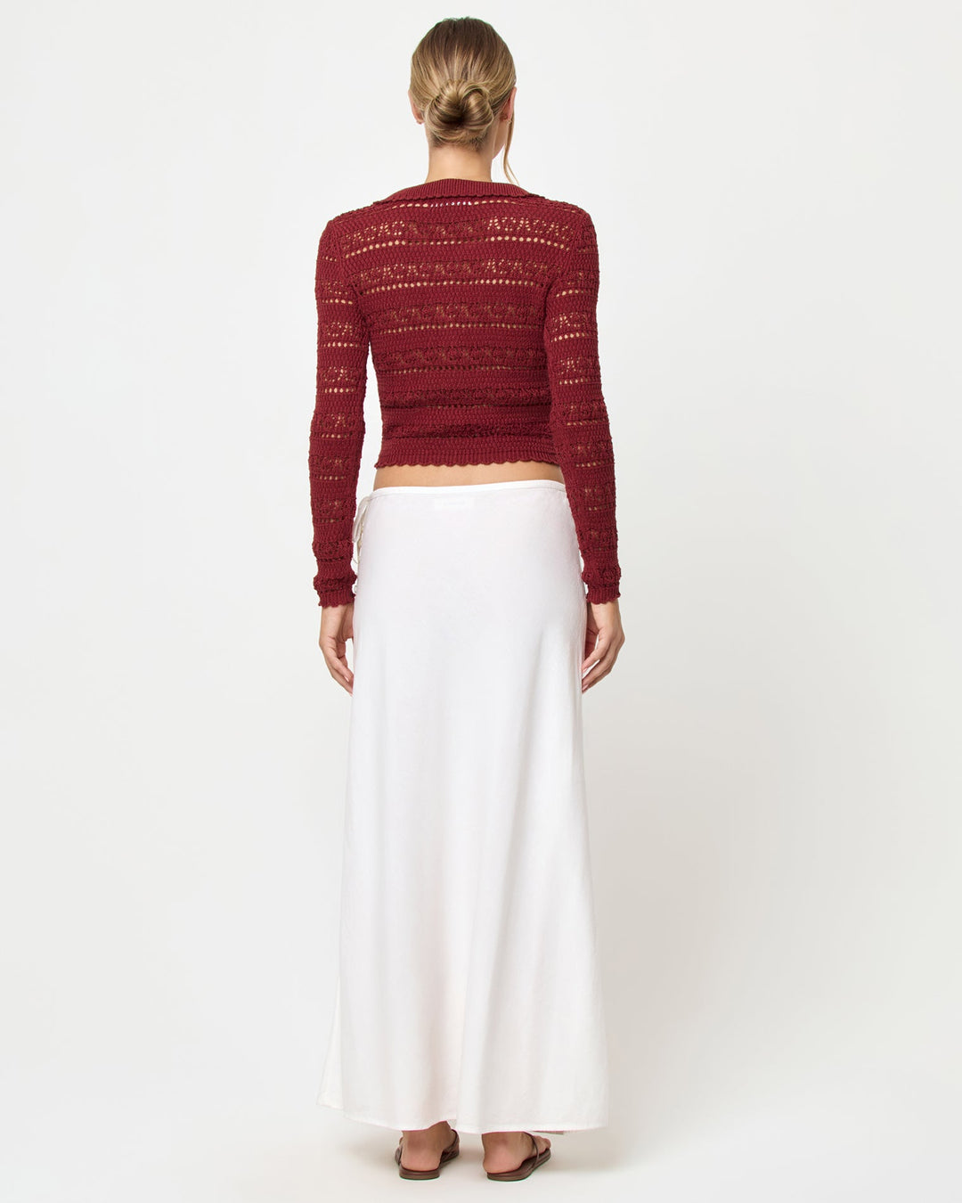 LSPACE Leighton sweater in Dusty Fig, back view on model.