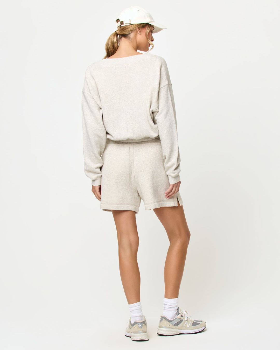 LSPACE Vaughn sweatshirt and Bennett Short in heather gray, back view on model.