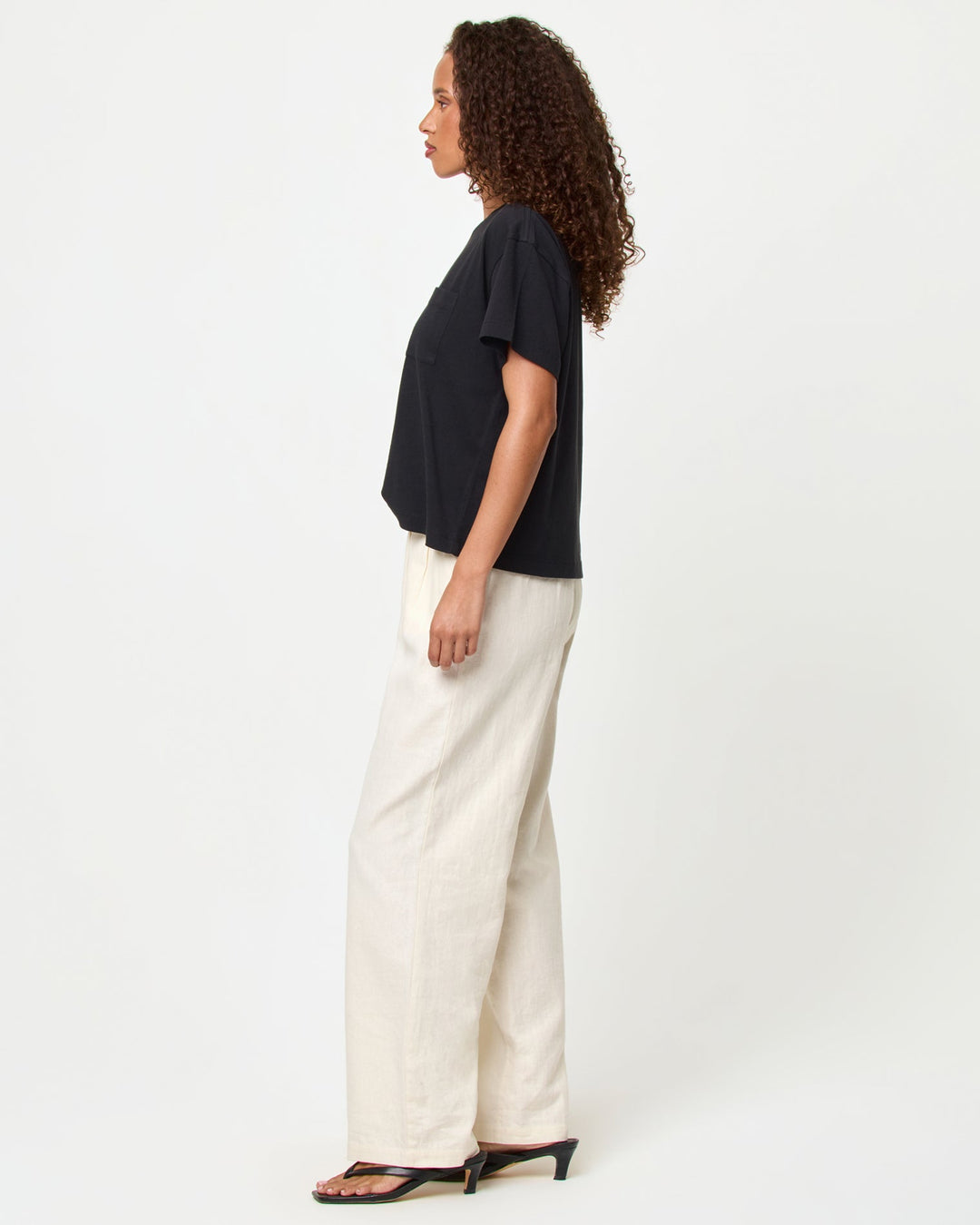 LSPACE Everyday tee in black, side view on model.