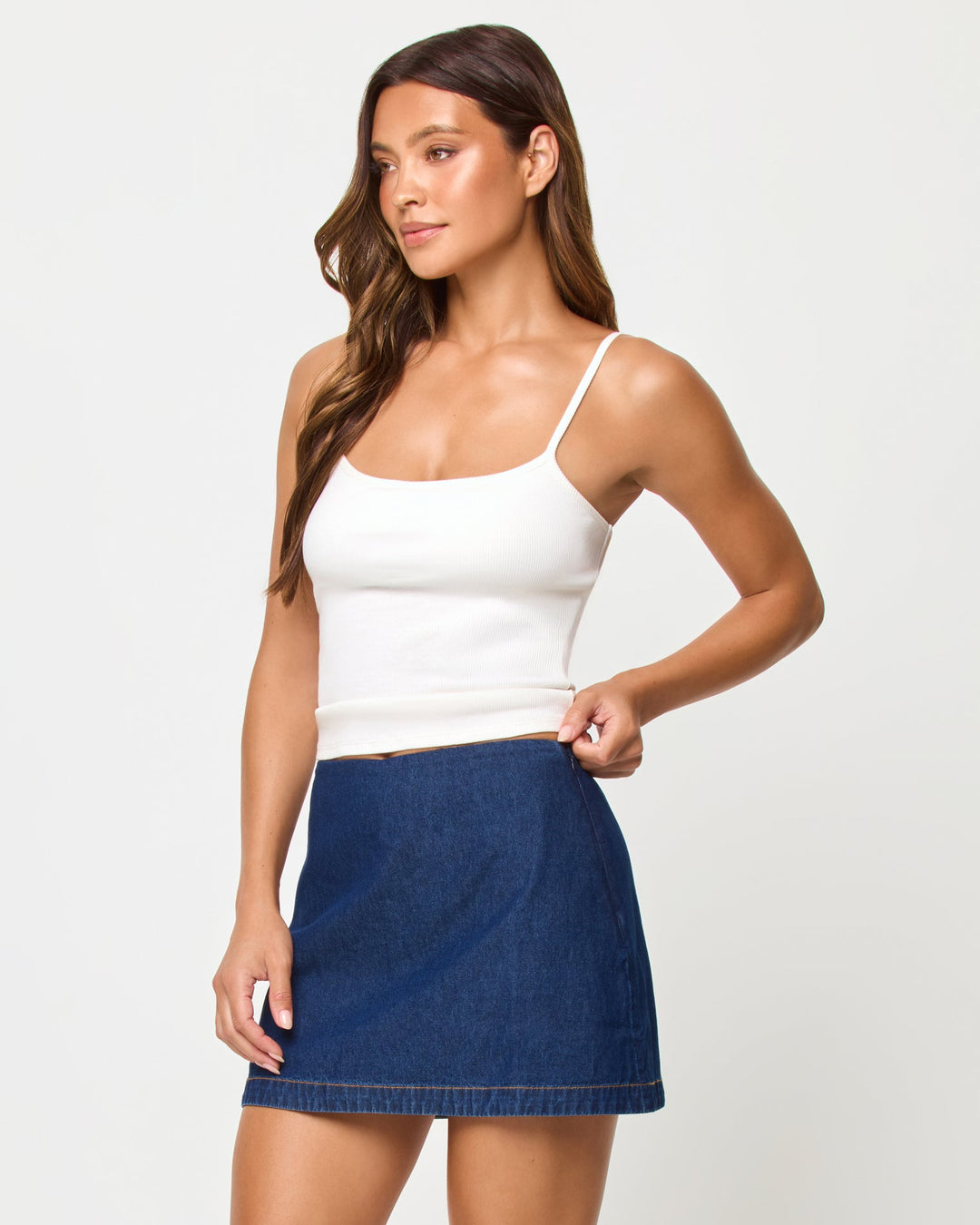 LSPACE Venice skort in Indigo Chambray, three-quarter view on model.