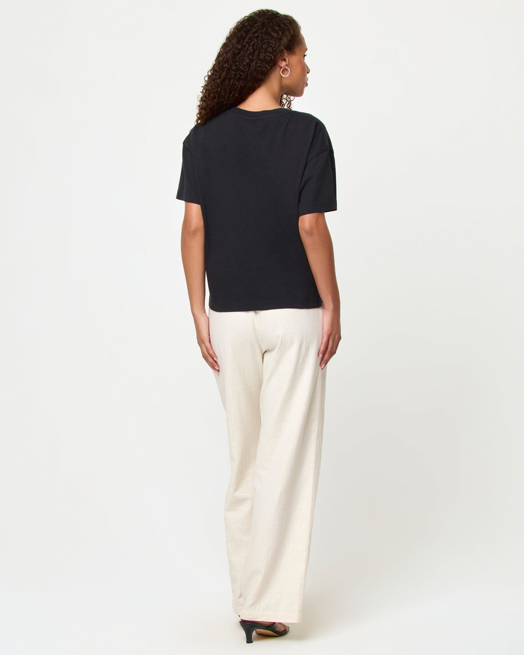 LSPACE Everyday tee in black, back view on model.
