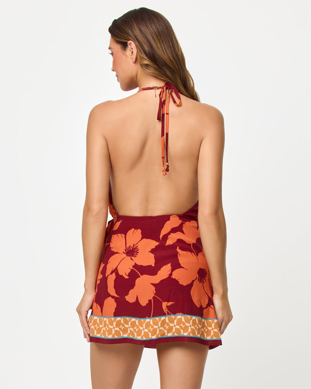 LSPACE Taura Mini Dress in Cocobolo print, back view on model.
