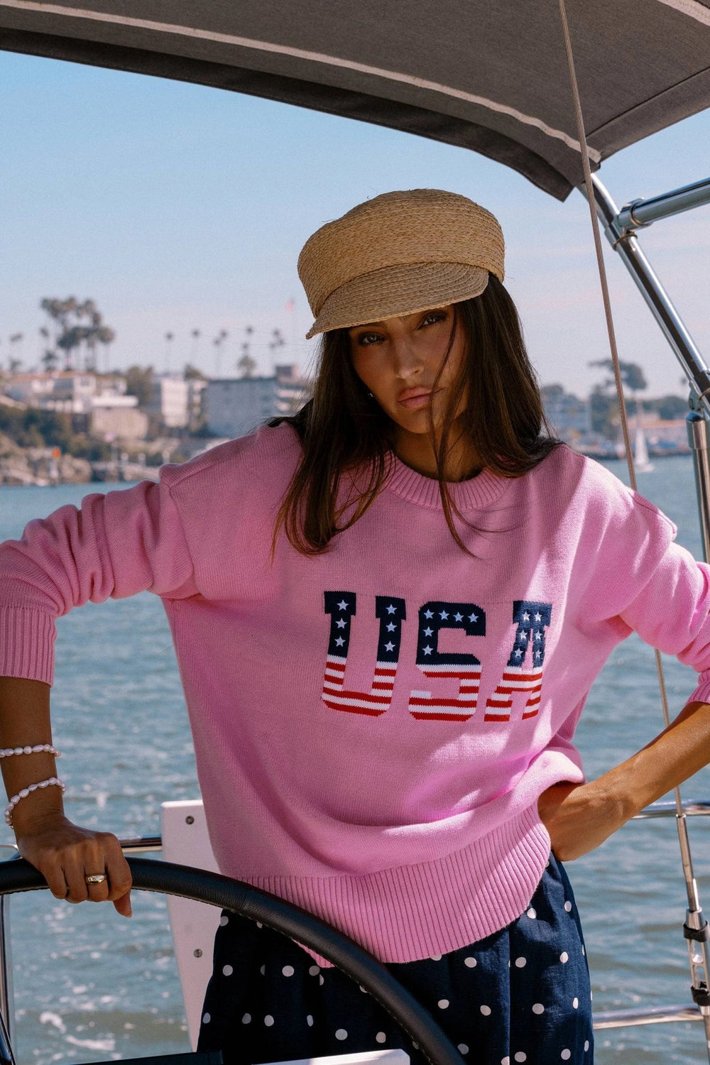 Model wearing Beach Riot Callie Oversized Crewneck Sweater in Pink USA