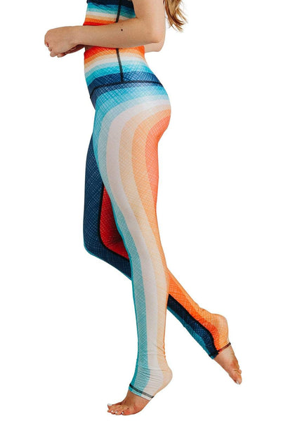 Yoga Democracy Women's Eco-friendly yoga full length leggings in retro rainbow stripes print. USA made from post-consumer recycled plastic bottles. Sweat wicking, anti-microbial, and quick dry ultra-soft brushed fabric.