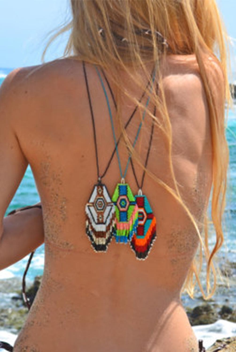 The Heart Majestic Jewelry Jelly Wax Fringe Necklace drapes perfectly over your beach, festival and yoga wear and adds an indie compliment to any look.